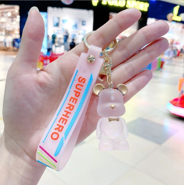 Porte-clés ours en peluche étiquette rose TRANSPAR