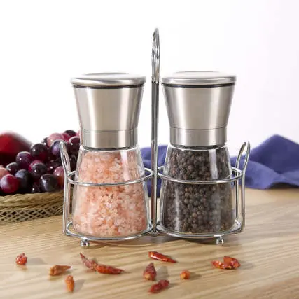 Salt and pepper mill set in glass with stainless steel stand