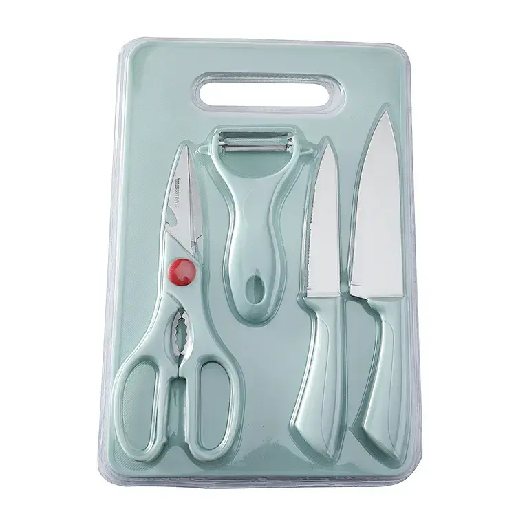[5 K08] Set of 2 knives, peeler, scissors and cutting board.